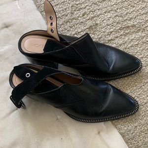 Coach black leather healed pointed shoes with buckle. Great Condition!